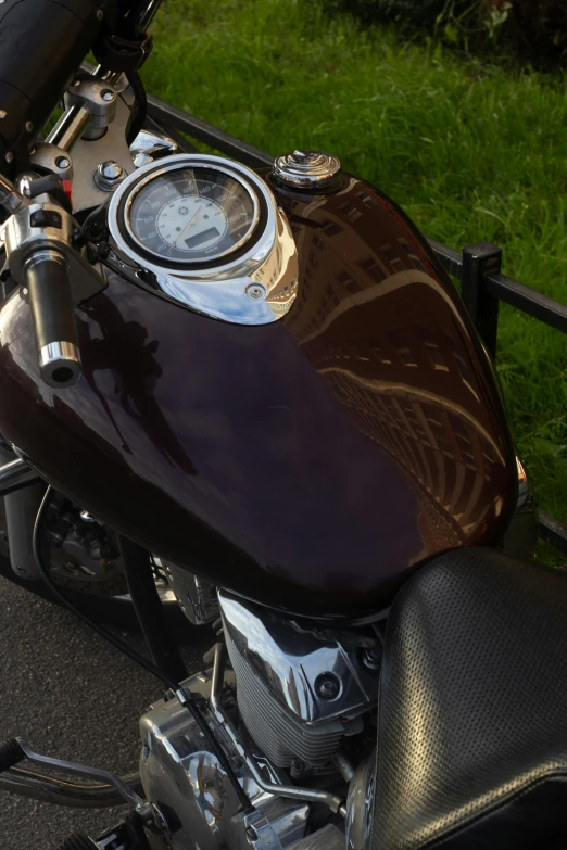 a close up of a motorcycle on a street, maroon metallic accents, shiny textured plastic shell, profile image, modded