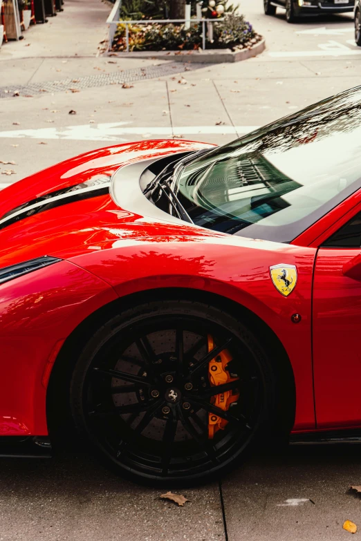 a closeup of the rear end of a car parked at a stop sign