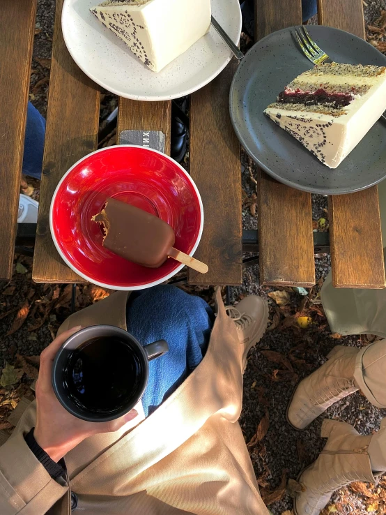 a table topped with plates of food and a cup of coffee, plein air, cake in hand, william penn state forest, cold as ice! 🧊, thumbnail