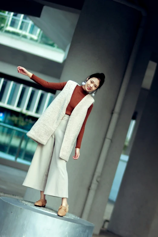 a woman in a white vest is posing for a picture, inspired by Ma Yuanyu, instagram, grey turtleneck coat, 奈良美智, fullbody, square