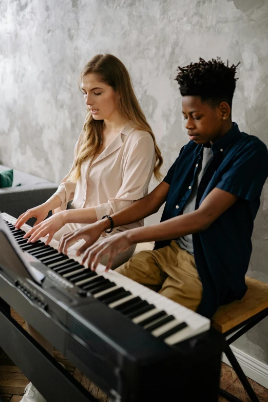 a couple of people that are sitting in front of a keyboard, trending on pexels, renaissance, performing, studio shot, for junior, group mass composition