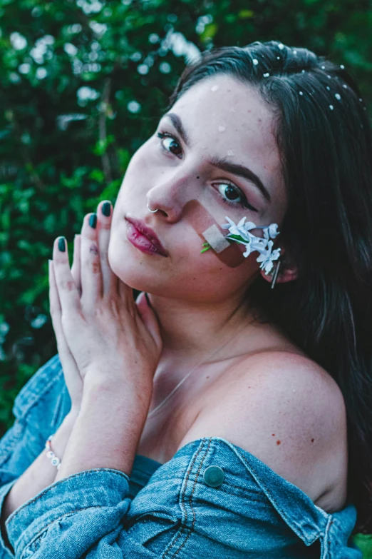 a woman with a flower in her hair, inspired by Elsa Bleda, trending on pexels, renaissance, hand on cheek, teenage girl, reflective skin, promo image