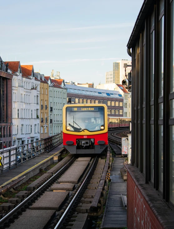 train tracks that lead to an area where people can board