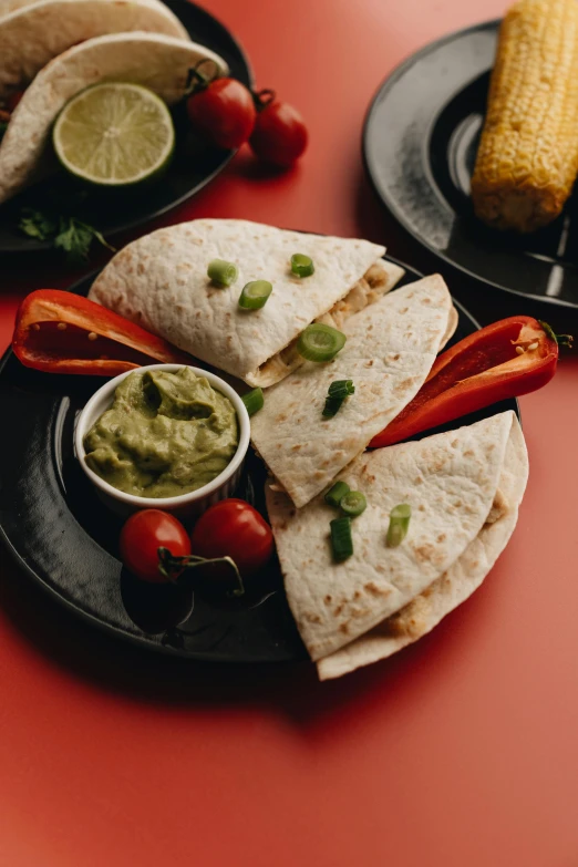 a close up of a plate of food on a table, thumbnail, tacos, high quality product image”, green bright red