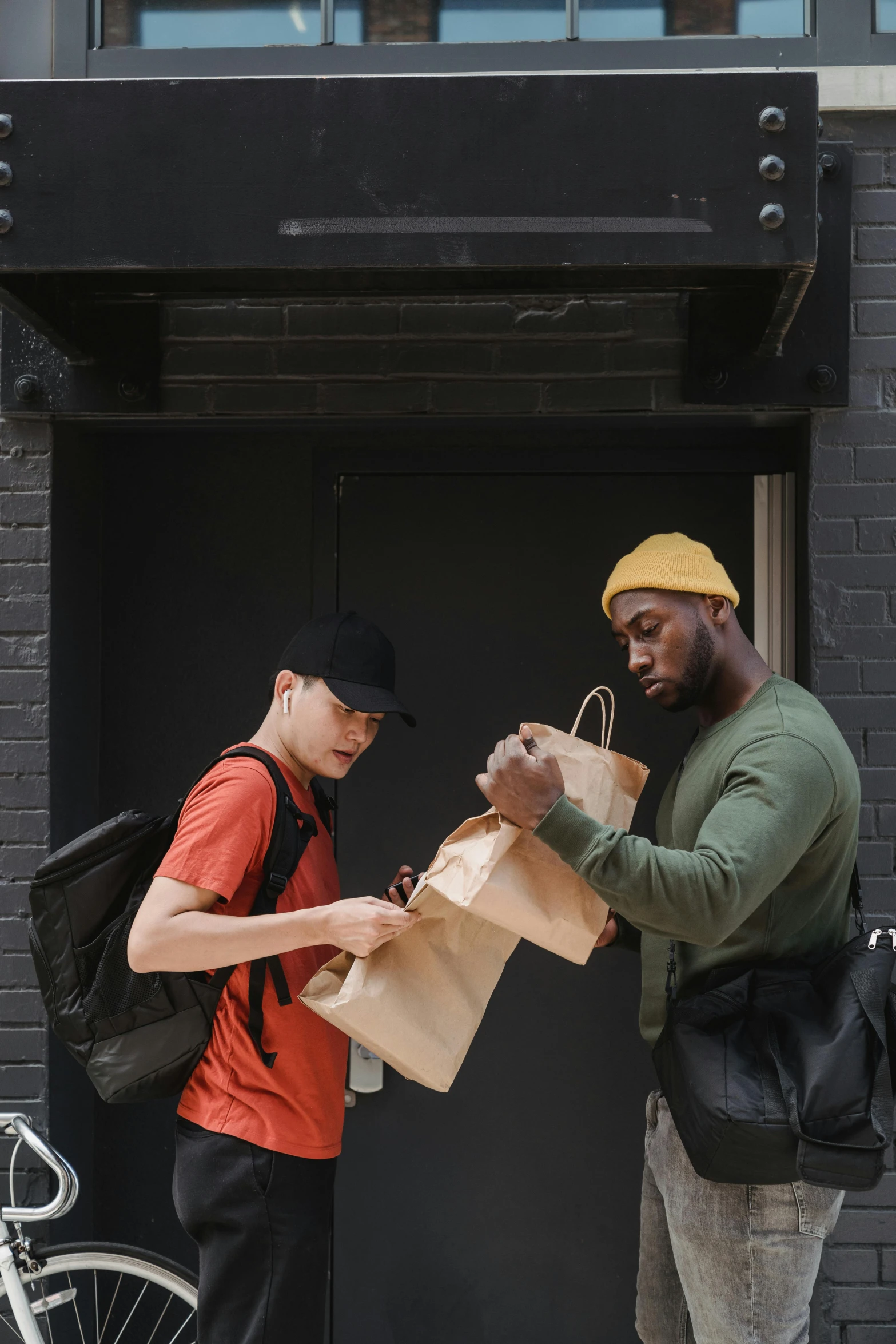 a couple of men standing next to each other, pexels contest winner, renaissance, getting groceries, virgil abloh, delivering mail, non-binary