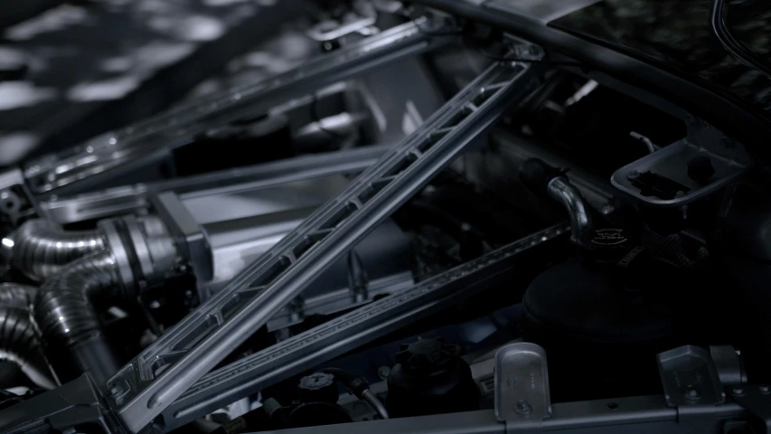 a close up of the engine of a motorcycle, polycount, precisionism, 2 0 2 1 cinematic 4 k framegrab, inside of a car, featuring rhodium wires, detailed shot legs-up