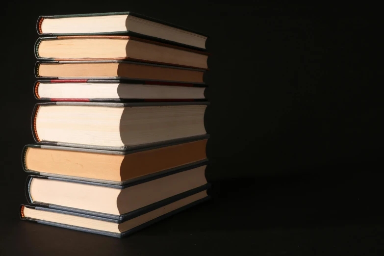 a stack of books sitting on top of each other, an album cover, pexels, figuration libre, with a black background, no - text no - logo, student, 1 2 9 7