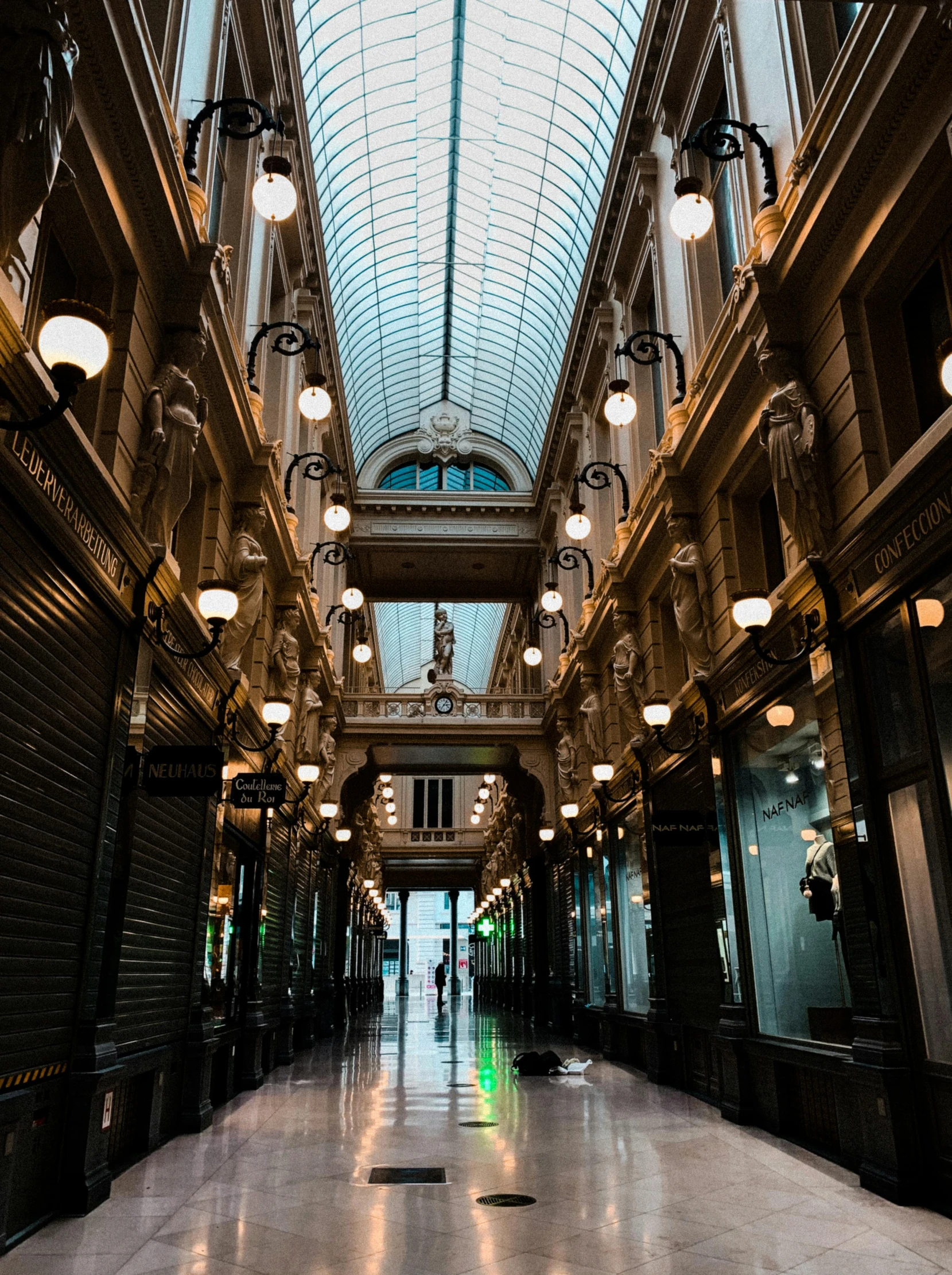 the empty indoor mall is very tall and bright