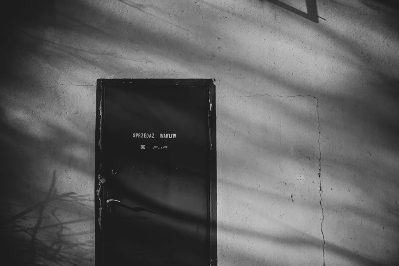 a black and white photo of a door, unsplash, some sunlight ray, top secret style photo, 15081959 21121991 01012000 4k, medium format. soft light