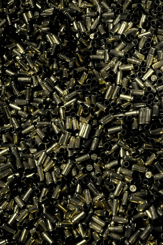 a pile of silver and black beads, by Joe Stefanelli, reddit, conceptual art, caseless ammunition, brass plated, thumbnail, noir