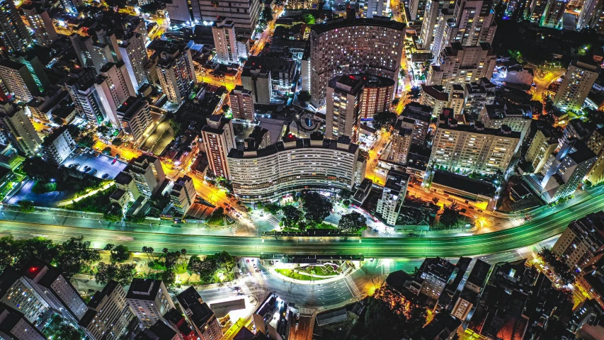 an aerial view of a city at night, by Felipe Seade, square, brazilian, japan sightseeing, high quality image”