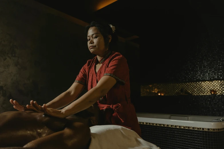 a woman getting a massage at a spa, a portrait, pexels contest winner, night time, nuttavut baiphowongse, thumbnail, gif