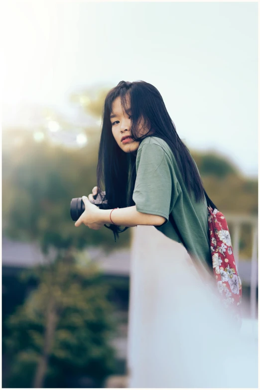 a woman taking a picture with a camera, by Tan Ting-pho, asian girl with long hair, medium format color photography, young teen, photograph taken in 2 0 2 0