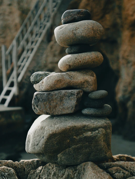 a pile of rocks sitting on top of a pile of rocks, unsplash, multiple stories, low quality photo, made of cement, ((rocks))