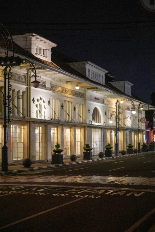 a white building has windows and lights