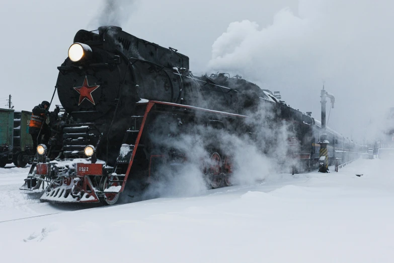 a train traveling down train tracks covered in snow, inspired by Vasily Surikov, pexels contest winner, socialist realism, steam engine, avatar image, russian soviet motifs, 🚿🗝📝