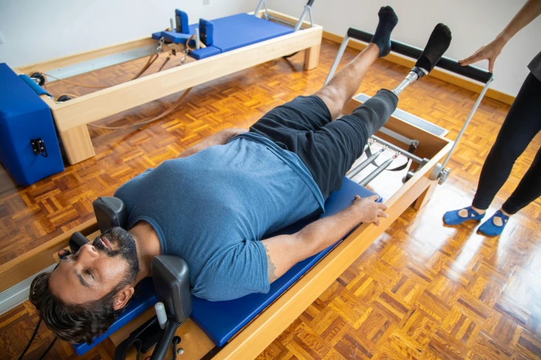 a man that is laying down on a pilates, private press, sydney park, avatar image