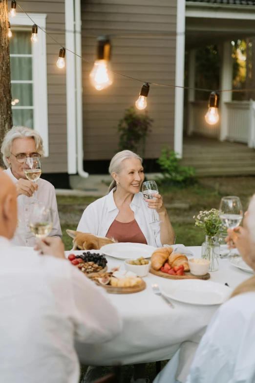 an older couple enjoying their lunch at a restaurant