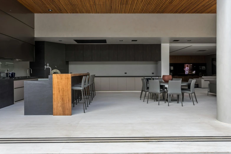 a wooden beam stands in the middle of a room