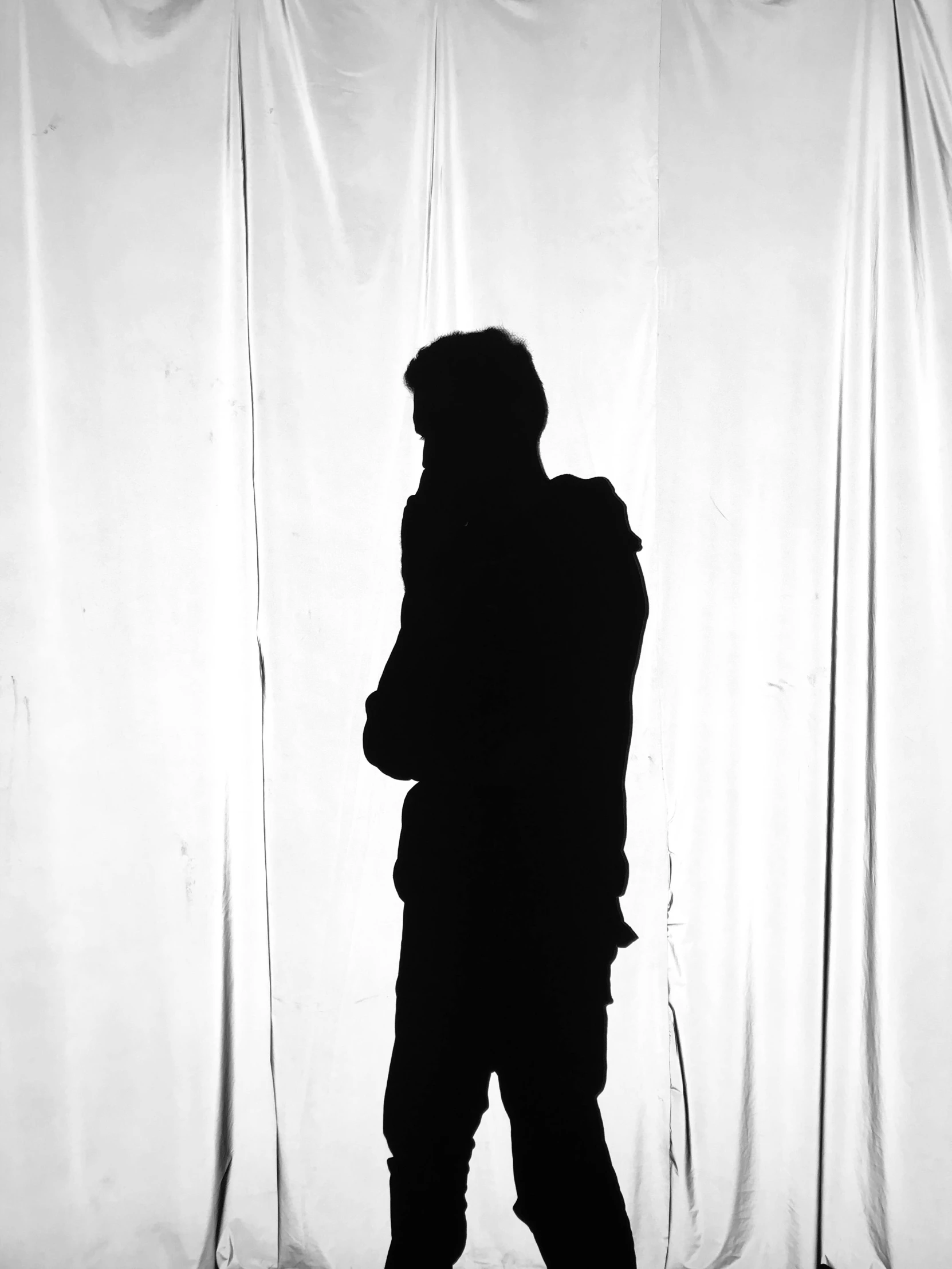 a silhouette of a person standing in front of a curtain, by Clifford Ross, showstudio, max dennison, by greg rutkowski, plain background