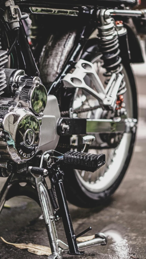 a close up of a motorcycle on a street, mechanical style, no duplicate image, inspect in inventory image, intricate gears and lenses