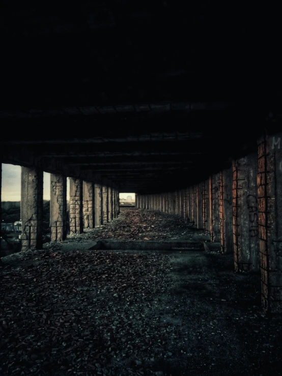 an image of a tunnel in the dark, inspired by Elsa Bleda, renaissance, ruins landscape, many columns, ground level view of soviet town, eyelevel!!! view!!! photography