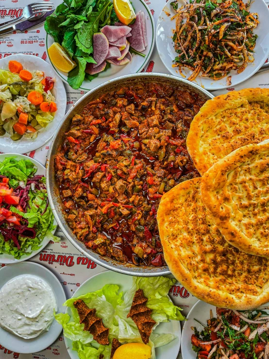 a table topped with lots of different types of food, a picture, pexels contest winner, dau-al-set, mixture turkish and russian, leftover meat pie, 🚿🗝📝, located in hajibektash complex