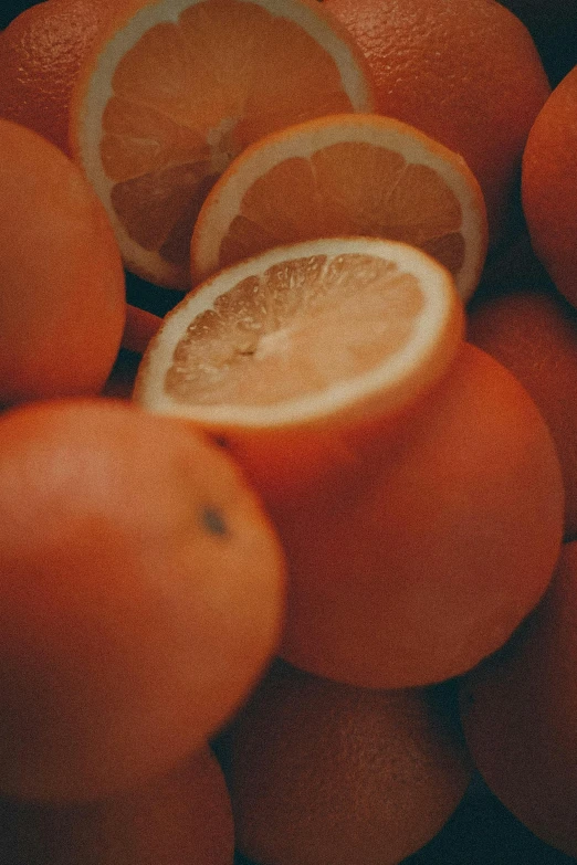 a pile of oranges sitting on top of each other, subtle detailing, indie film, bottom body close up, juice