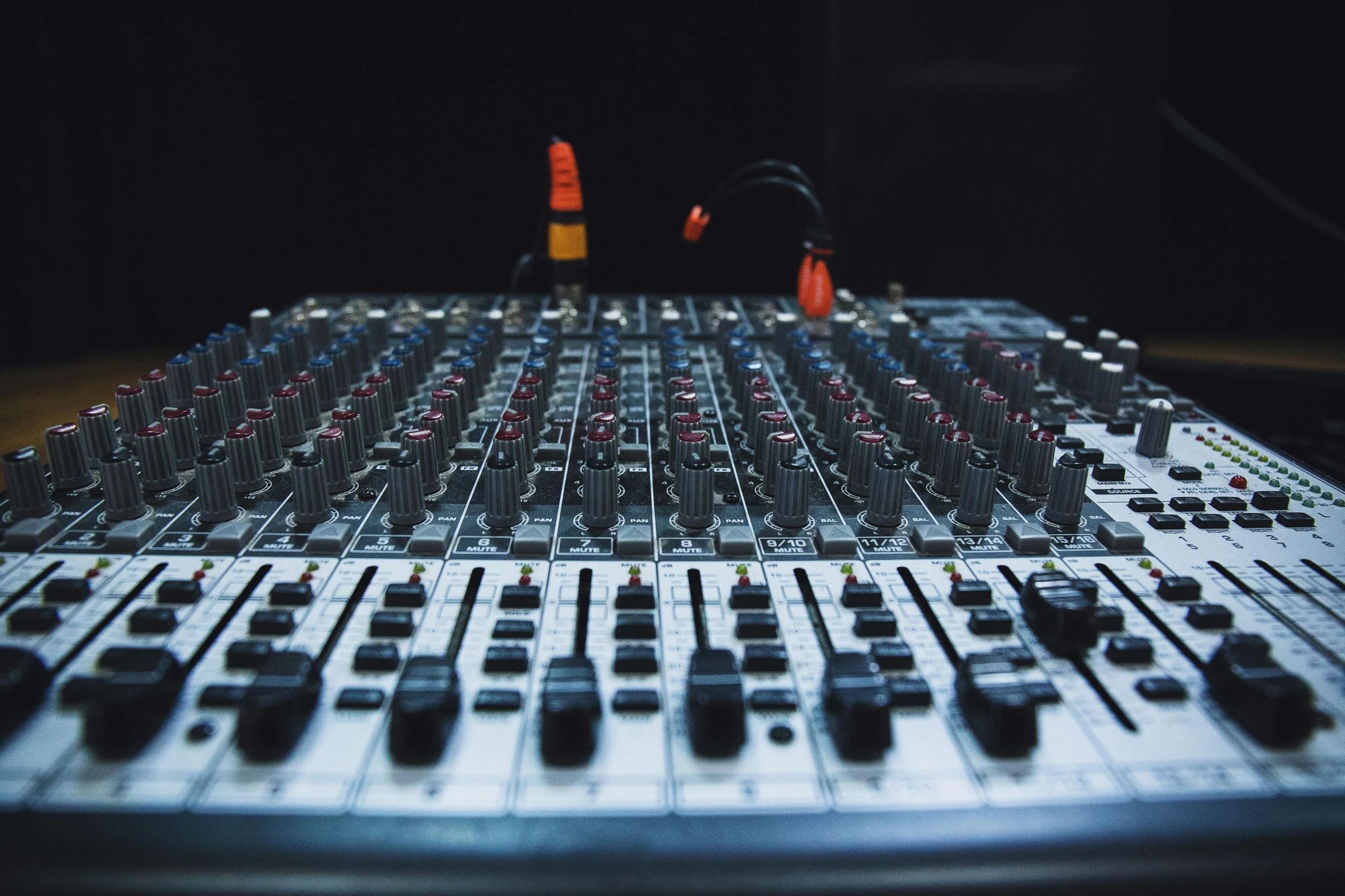 a mixing board sitting on top of a wooden table, pexels, multiple stories, during the night, transparent background, cables out of the ears