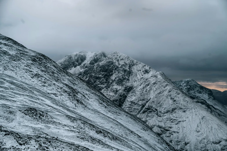 this is the mountains and sky as the clouds roll in