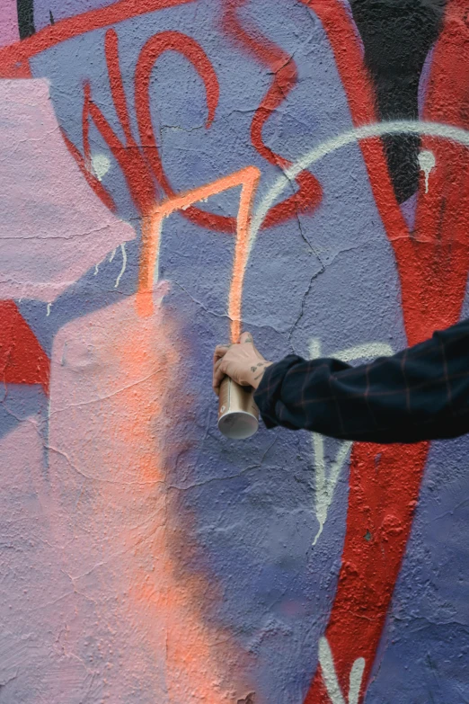 a man spray painting graffiti on a wall, by Mór Than, up-close, thick paint visible, warm shading, ap art