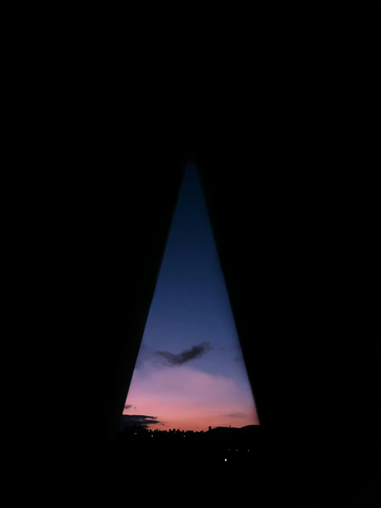 a view of a sunset through a window, an album cover, inspired by Attila Meszlenyi, unsplash, land art, obelisk, stargate, angular minimalism, (night)