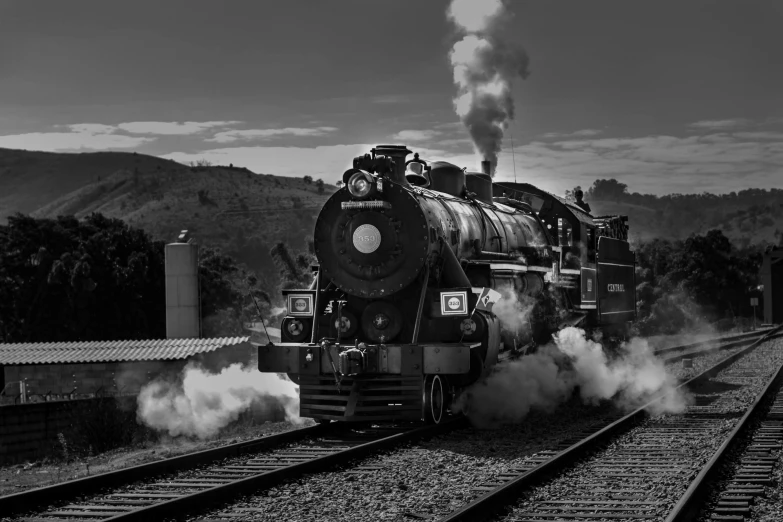 a black and white photo of a steam engine train, pixabay contest winner, at full stride, 8k octan advertising photo, large blue engines, brass and steam technology