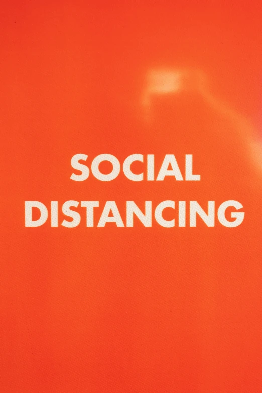 a red background with the words social distancing, by Rachel Reckitt, close - up photograph, orange, white, high quality photo