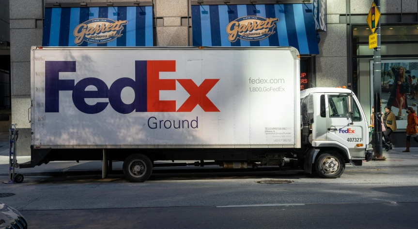 a fed ex truck parked on a city street, an album cover, by Jason Felix, pexels, ((purple))