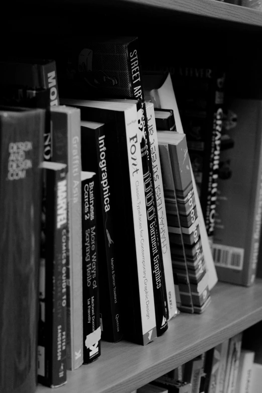 a black and white photo of a bookshelf full of books, academic art, uploaded, industries, black and white), overview