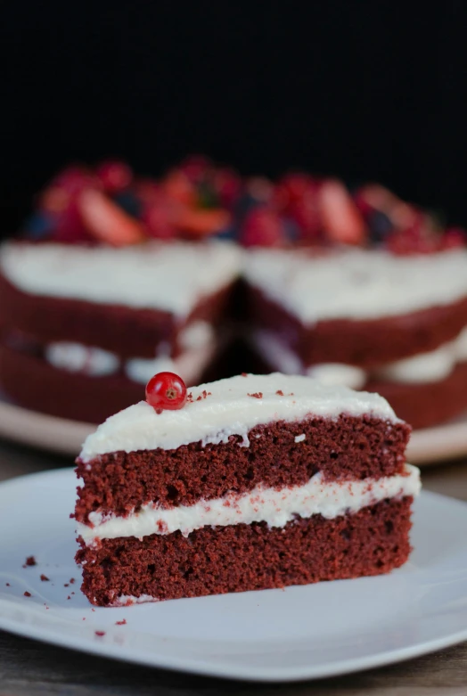 a piece of cake sitting on top of a white plate, dressed in red velvet, fruit, high quality product image”, red!! sand