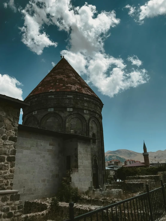 a tall tower sitting on top of a stone building, by Muggur, pexels contest winner, romanesque, panorama view of the sky, georgic, rounded roof, today\'s featured photograph 4k
