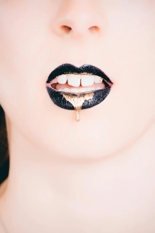 a close up of a person with black lipstick, an album cover, inspired by Hedi Xandt, trending on pexels, aestheticism, dripping honey, mouth half open, tear, liquid gold