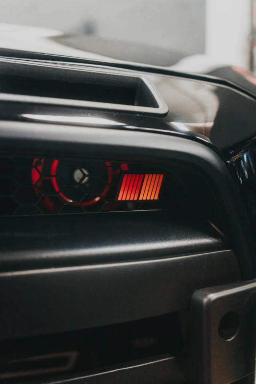 the taillight of an older model sports car