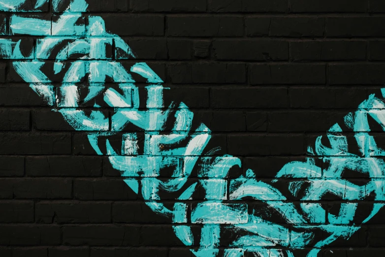the letter v is painted on a brick wall, graffiti art, pexels contest winner, black and cyan color scheme, dna helix, background image, large chain