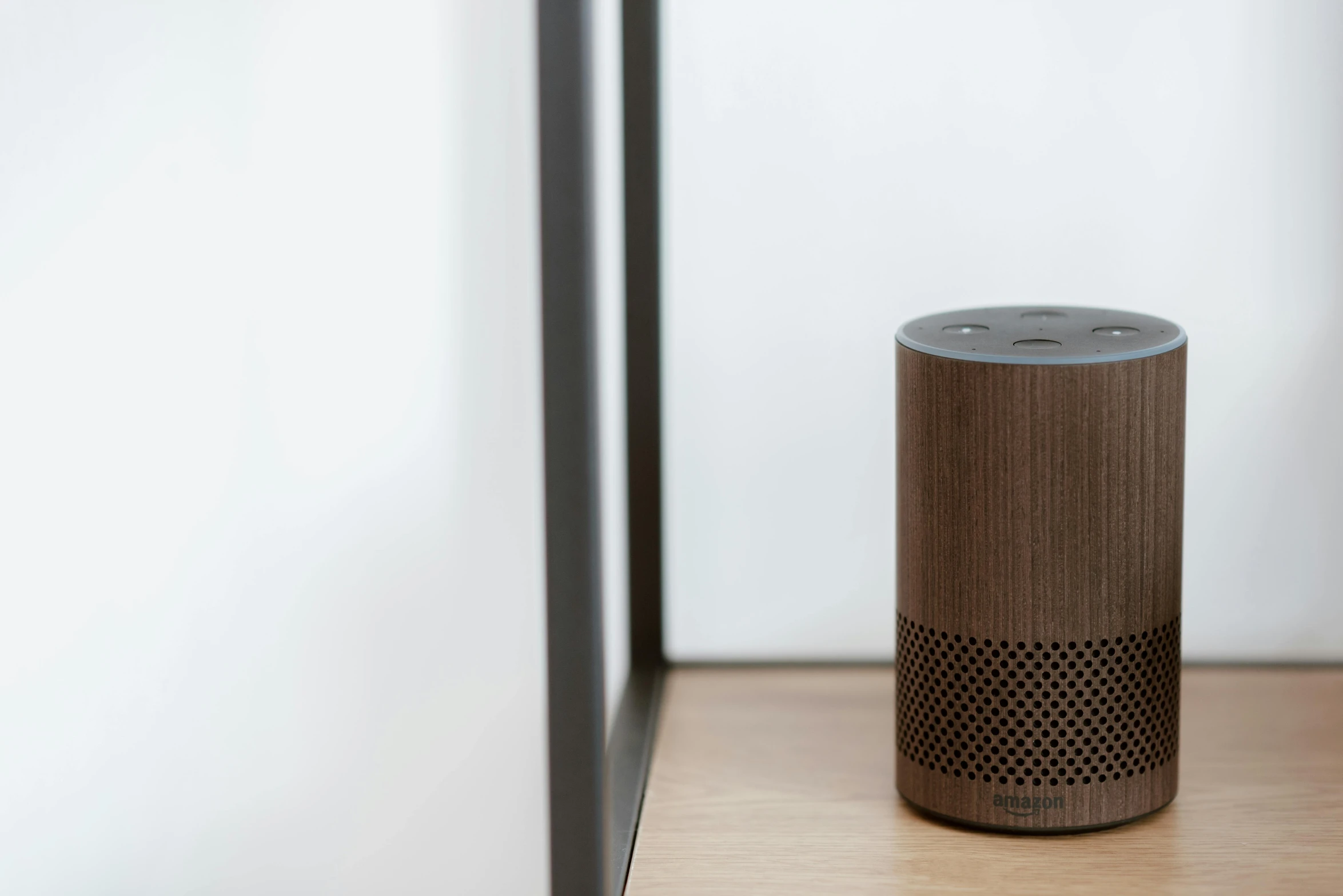 a smart speaker sitting on top of a wooden table, a portrait, by Carey Morris, minimalism, kiss, 15081959 21121991 01012000 4k, alexa grace, brown