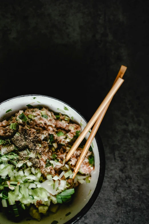 a bowl of food with chopsticks in it, unsplash, square, full body image, salad, tatsumaki