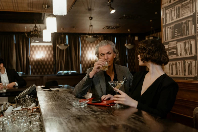 a group of people sitting at a bar drinking wine, a portrait, by Emma Andijewska, pexels contest winner, medium shot of two characters, 15081959 21121991 01012000 4k, drinking whiskey, slightly minimal