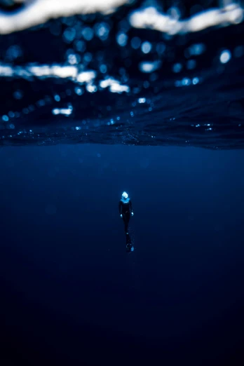 a person is floating in the ocean