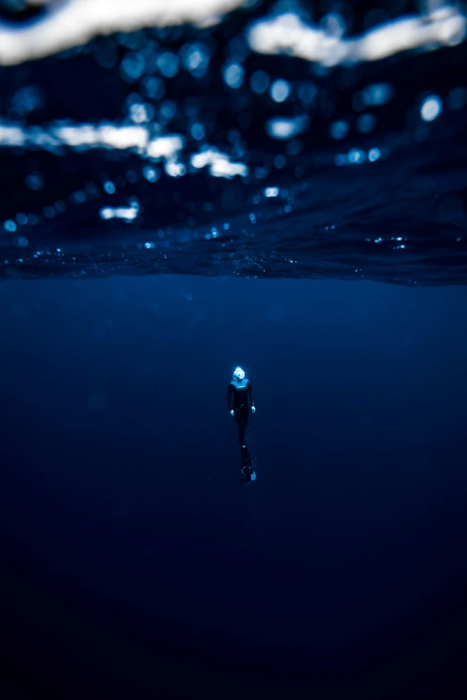 a person is floating in the ocean