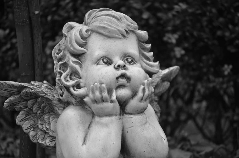 a black and white photo of a statue of an angel, inspired by Margaret Brundage, pixabay contest winner, cute pout, shocked look, cutest, cherubic