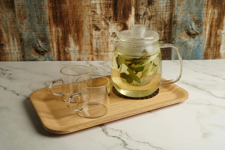 a tea pot sitting on top of a wooden tray, pexels, square rimmed glasses, full product shot, oak, taiga