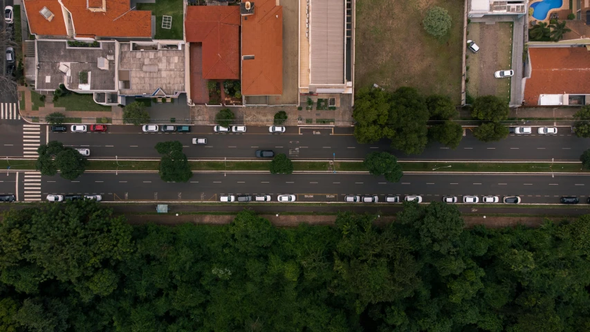 the top view of cars parked in front of some houses