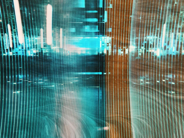 a blurry photo of a city street at night, a hologram, inspired by Bruce Munro, pexels contest winner, computer art, cyan and orange, rippling reflections, translucent glass shine, abstract detail